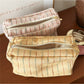 Close-up of Cosbai pastel plaid cosmetic bag showing fabric texture and pattern