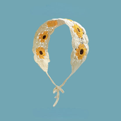 Haila crochet flower hairband displayed on a neutral background