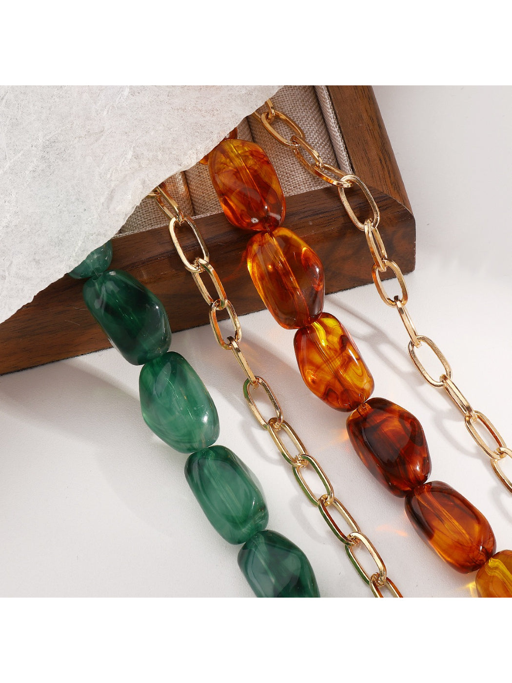 Neckit necklace with vibrant beads arranged in a gradient pattern