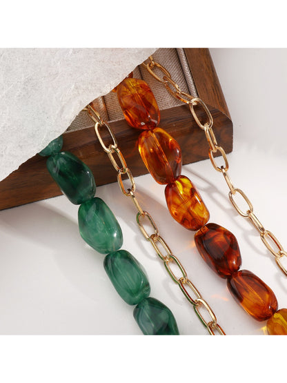 Neckit necklace with vibrant beads arranged in a gradient pattern