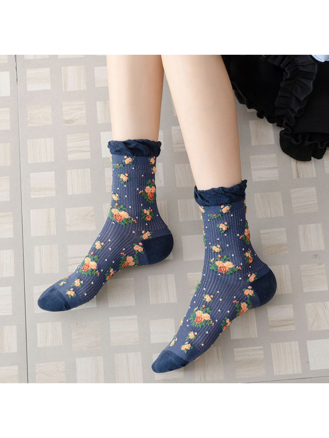 Rufia vintage rose floral crew socks worn on feet with visible ribbed cuff