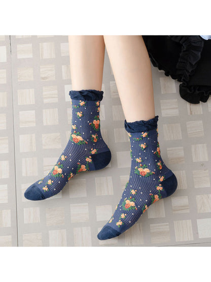 Rufia vintage rose floral crew socks worn on feet with visible ribbed cuff