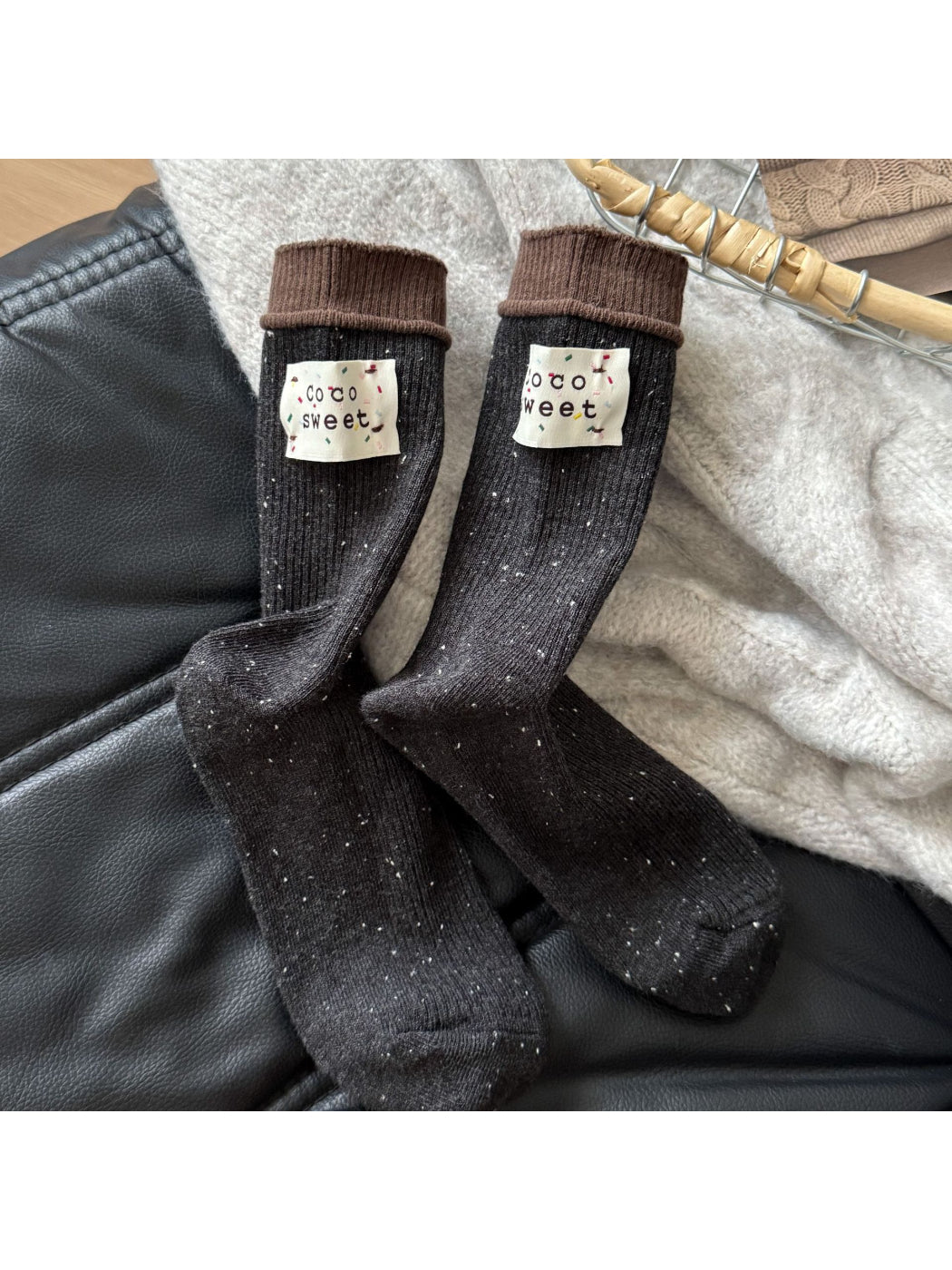 Close-up of toe and heel area of Rufia speckle knit crew sock