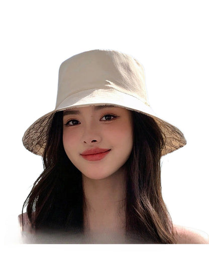 Haila reversible hat folded to display both flower print and solid sides