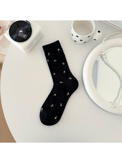Rufia soft blossom pattern crew socks packaged with branded label