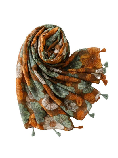 Flat lay of Scarvii Garden Bloom Tassel Scarf showing full floral design and tassel trim