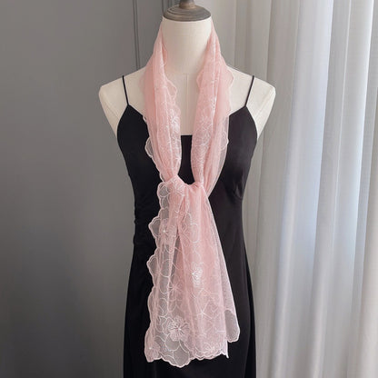 Scarvii floral lace pearl trim scarf displayed on a wooden surface