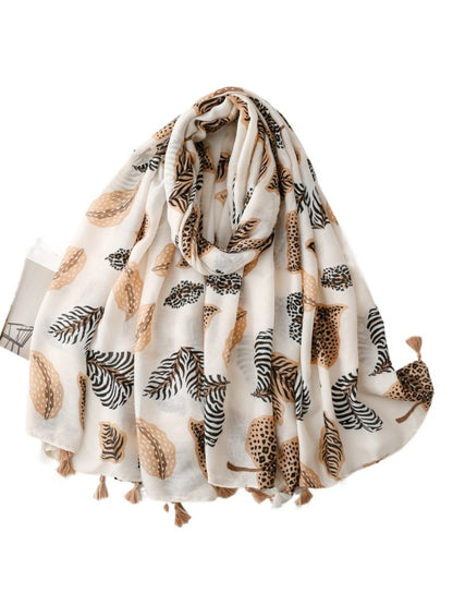 Scarvii Jungle Leaf Fringe Scarf displayed flat showing green leaf pattern and fringed edges