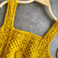Close-up of strap and neckline on Crosa vintage crochet camisole tank top