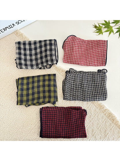 Close-up of classic check tie head scarf fabric texture and pattern