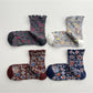 Rufia Heart White Mid-Calf Socks laid flat showing full length and heart pattern