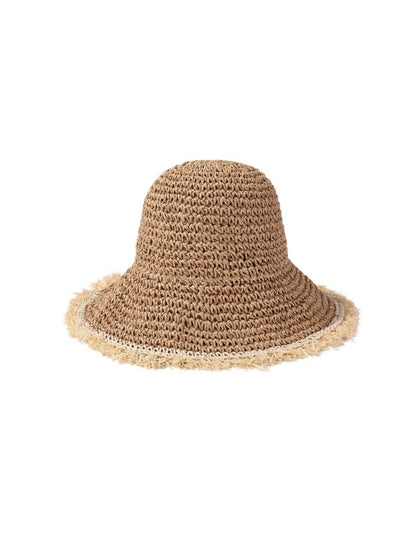 Close-up of Haila hat's textured straw weave and natural fibers