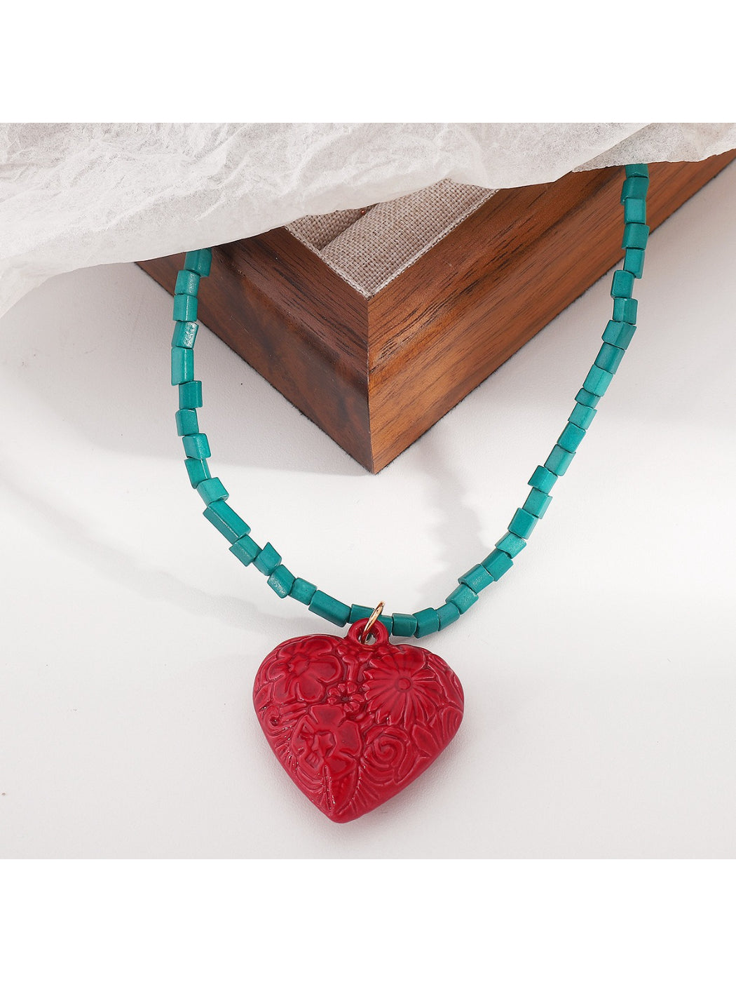 Color Charm beaded necklace with mixed color beads displayed on a wooden background