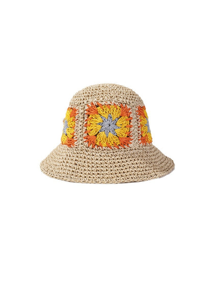Back view of Haila beige bucket hat showing crochet flower patch