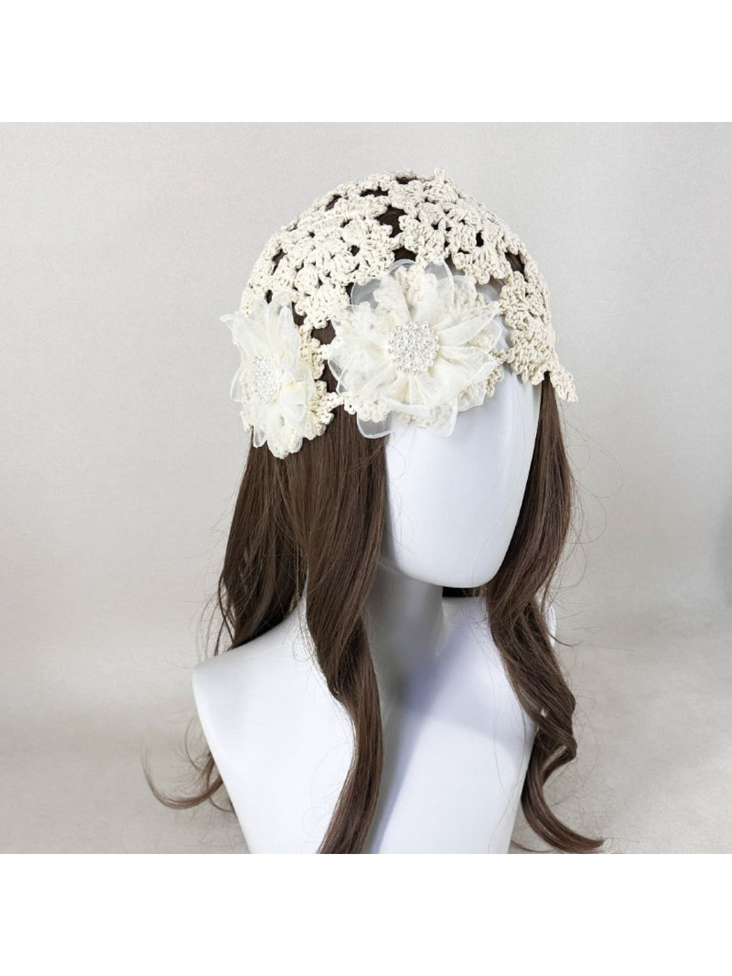 Haila romantic openwork hat with detailed flower embellishment in soft beige