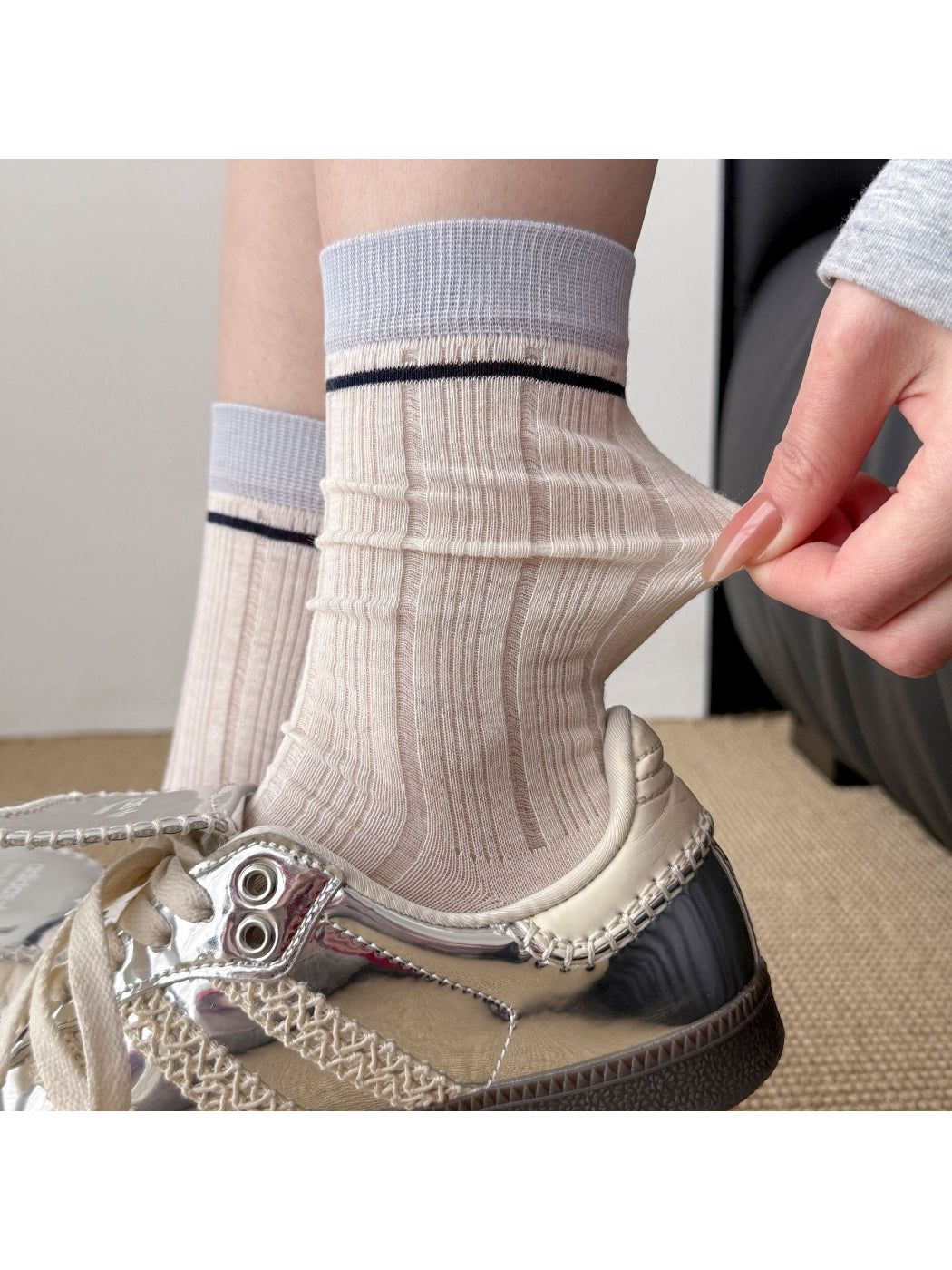Rufia crew socks laid flat showing full length and stripe details