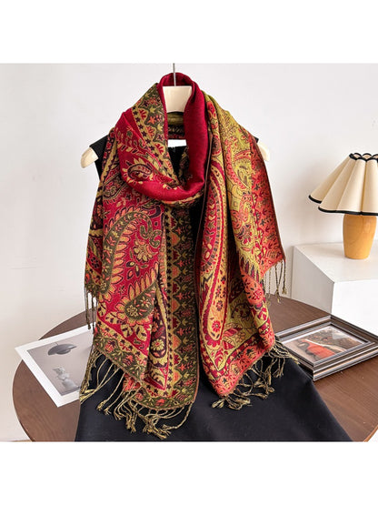 Model styling the scarf as a shawl over a casual outfit