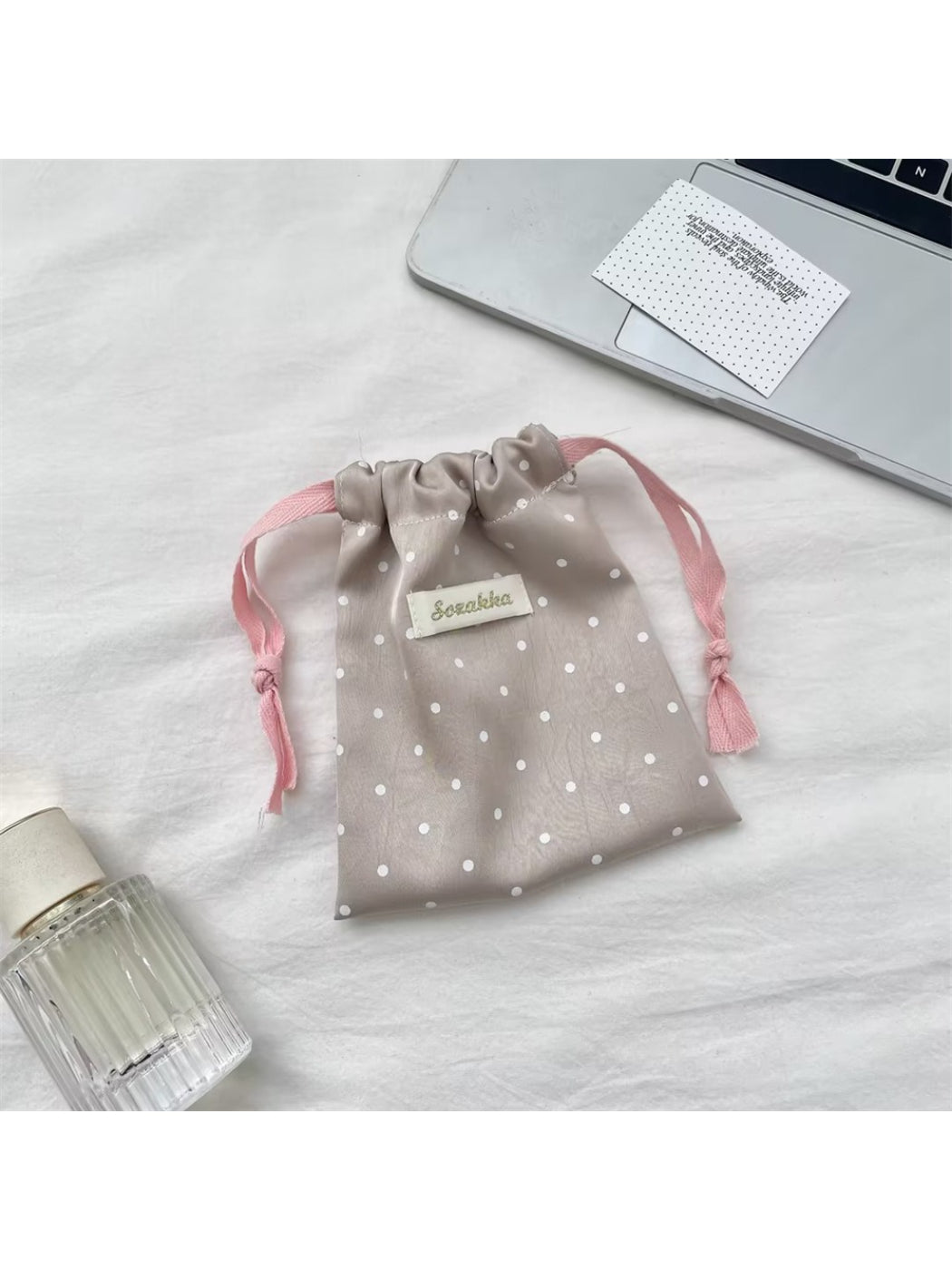 Side view of Cosbai Sweet Dot Drawstring Bag highlighting drawstring closure