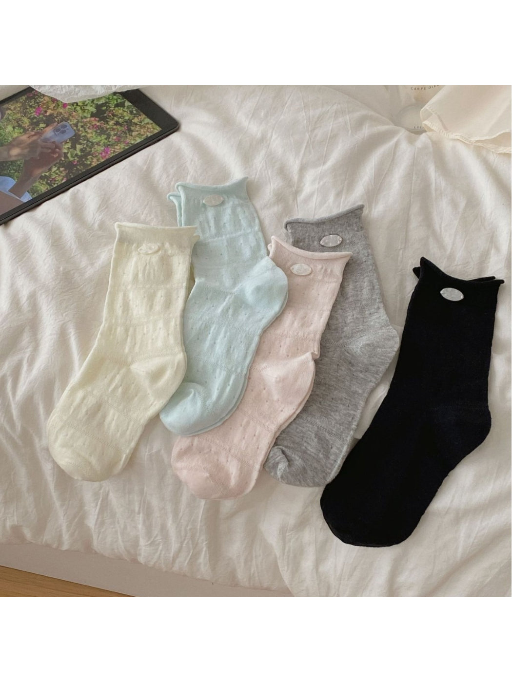 Rufia mesh dot mid-calf socks displayed flat showing sheer fabric with dot pattern