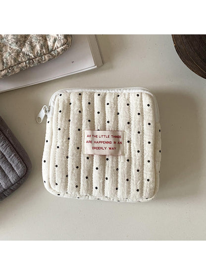 Cosbai cartoon print mini storage pouch photographed with natural lighting