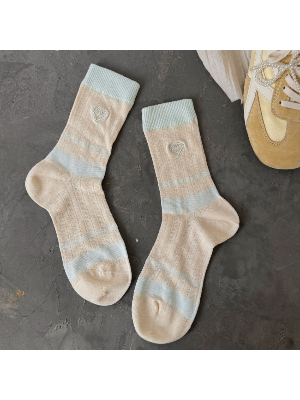 Side view of Rufia heart socks showing heel and toe colourblock details