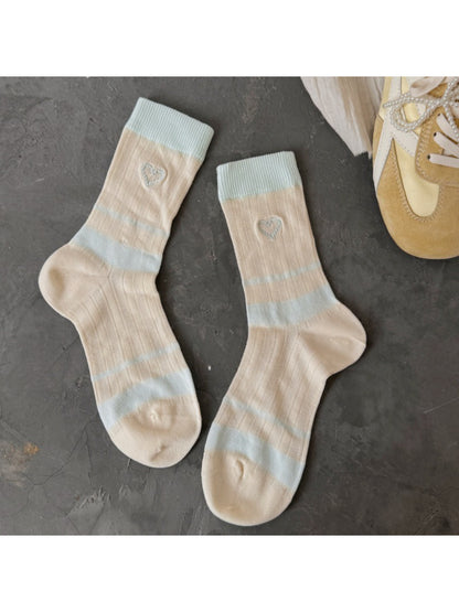Side view of Rufia heart socks showing heel and toe colourblock details