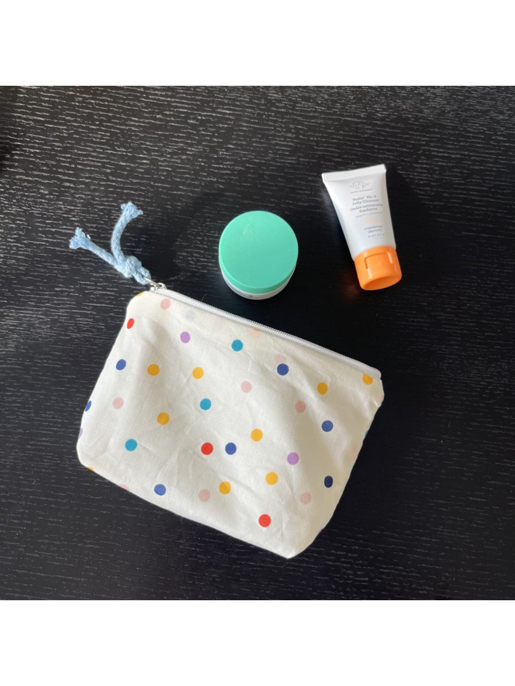 Side view of Cosbai mini pouch bag highlighting compact size