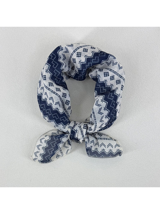 Scarvii geometric pattern square scarf folded showing blue and beige design