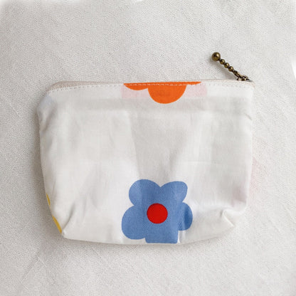 Cosbai canvas printed coin purse angled to show colorful design and shape