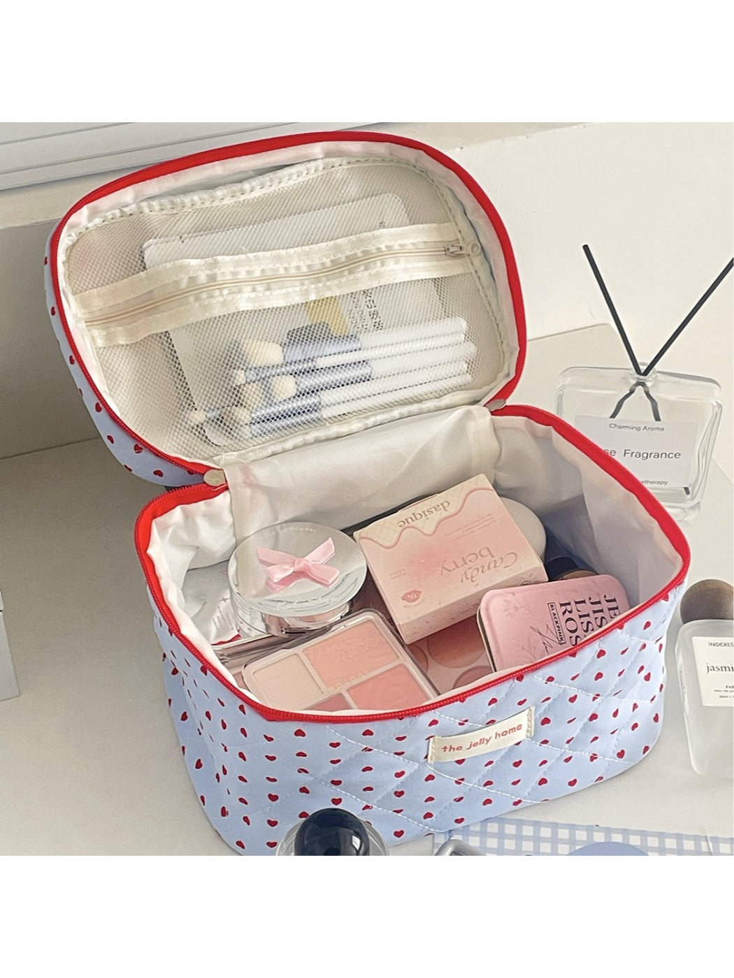 Open view of Cosbai heart pattern cosmetic organizer showing multiple and