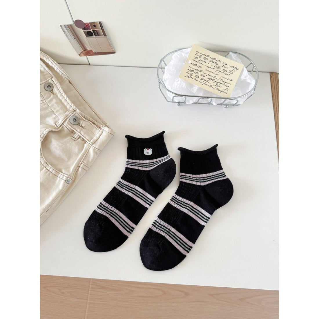 Side view of Rufia Cute Bear Stripe Crew Socks highlighting soft knit texture