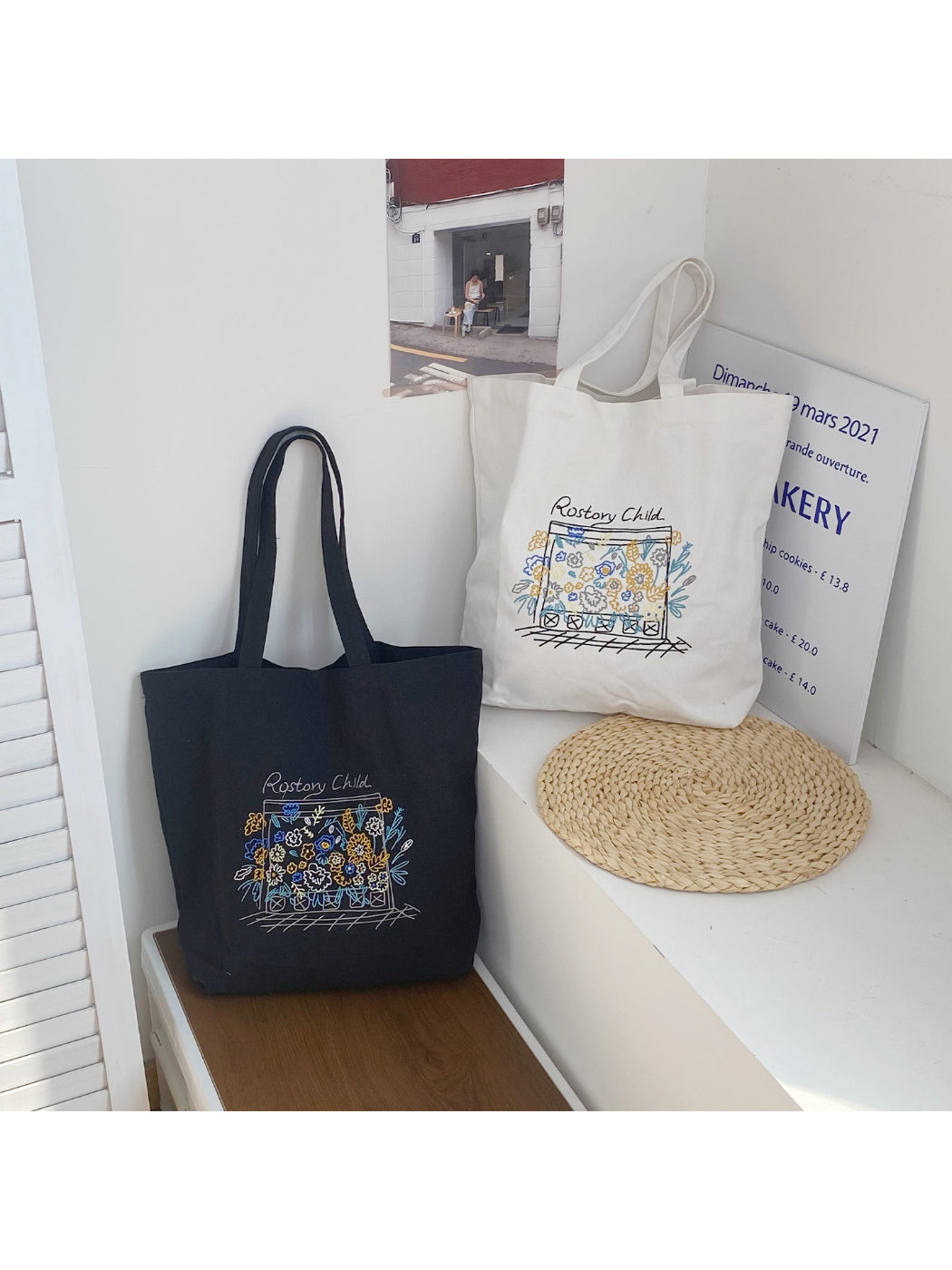 Cosbai tote bag showing sturdy handles and floral print
