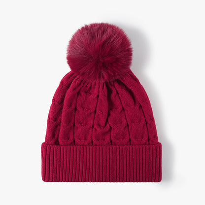 Red plush lined cable knit pom beanie