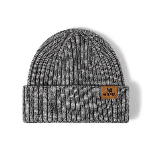 Gray label patch ribbed knit beanie front view