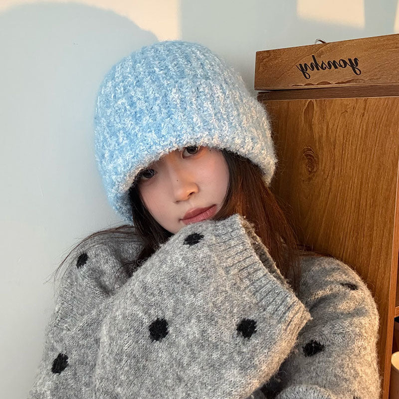 Light Blue textured fleck knit beanie front view on a model