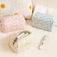 Cosbai small floral makeup organizer with pink and white flower pattern on a white background