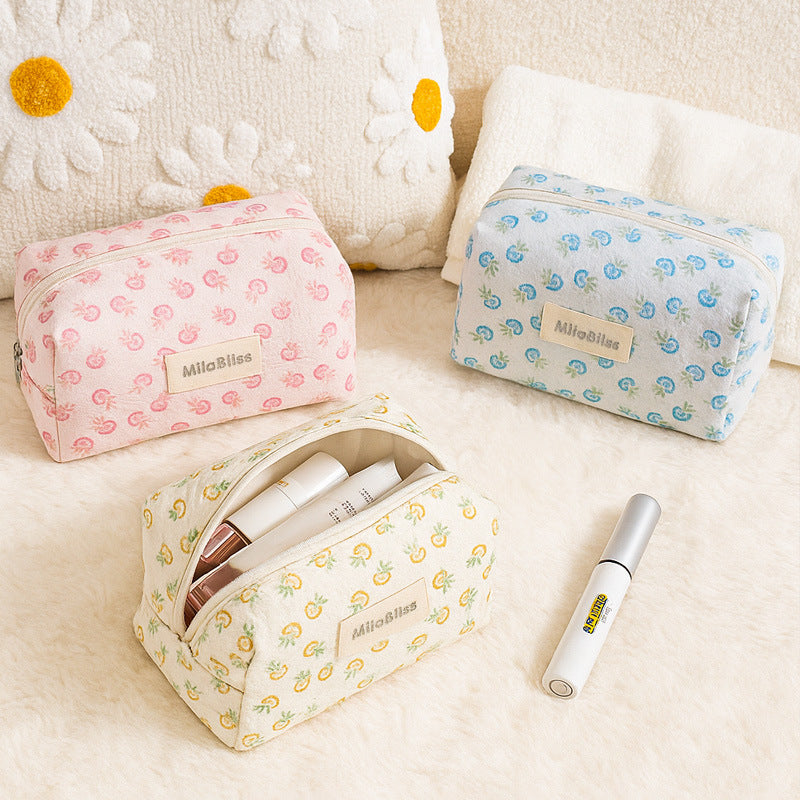 Cosbai small floral makeup organizer with pink and white flower pattern on a white background