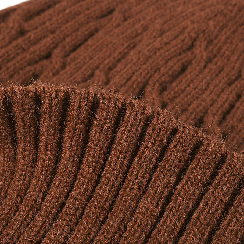 Navy fleece-lined cable-knit cuffed beanie product view