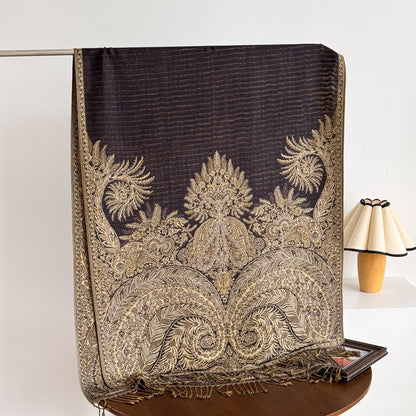 Scarvii paisley scarf draped over wooden hanger