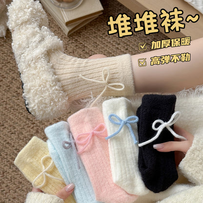 阿程家批发澳绒袜子女士秋冬加绒加厚中筒袜保暖冬季蝴蝶结堆堆袜