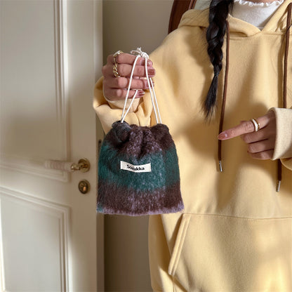 Cosbai cosmetic storage drawstring bag partially open showing interior space