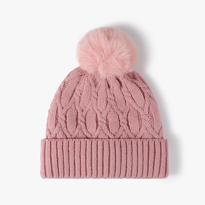 Pink cable knit pom-pom cuffed beanie product view