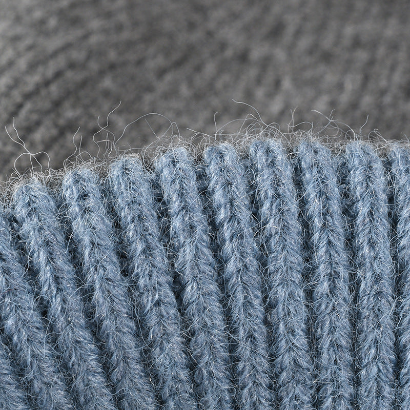 Gray colorblock plush lined pom knit beanie detail
