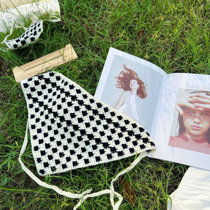 Scarvii crochet plaid hairband displayed on a white background