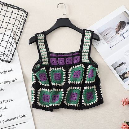 Crosa Bohemian mesh crochet tank top hanging against plain background