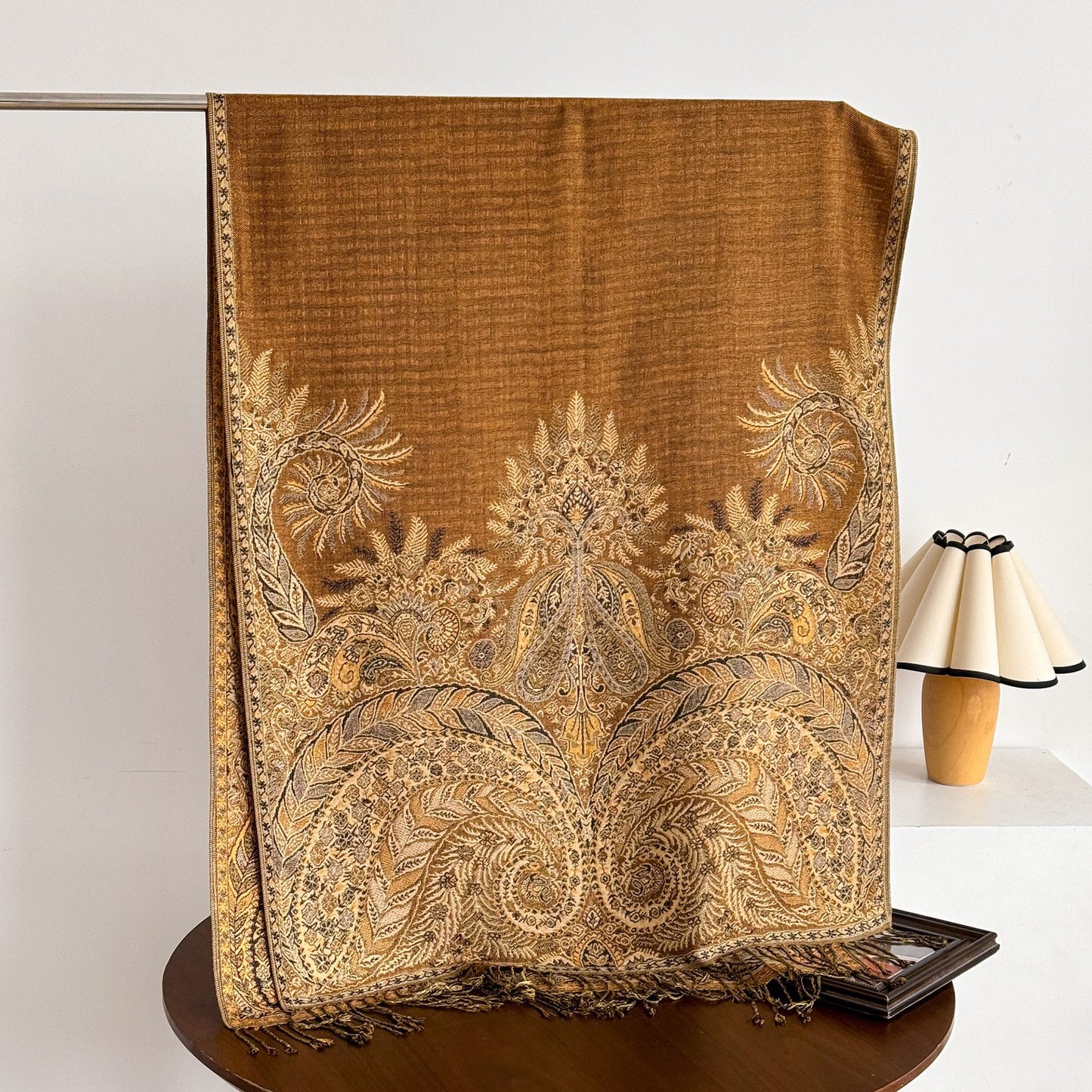 Scarvii scarf laid flat showing full paisley design and tassels