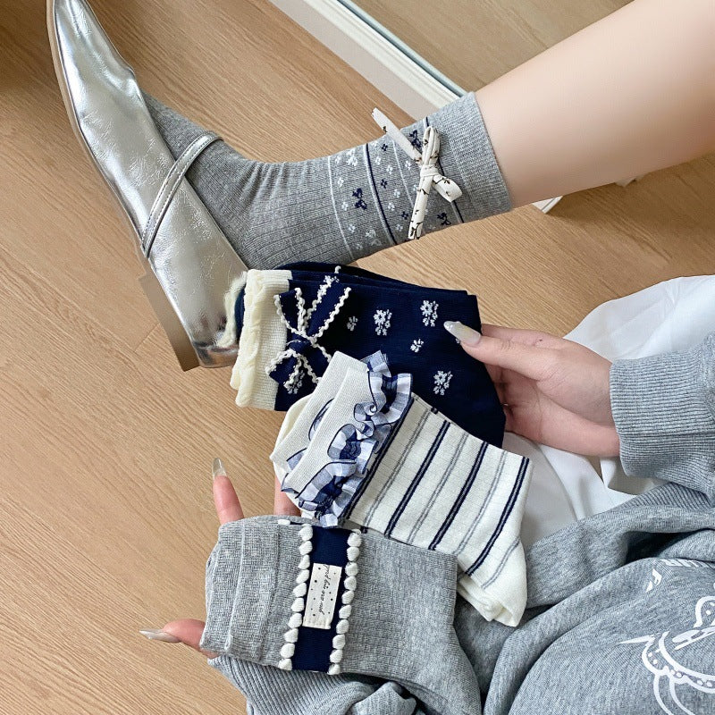 韩国袜子女甜美蝴蝶结饰品中筒袜日系碎花ins布标条纹花边堆堆袜