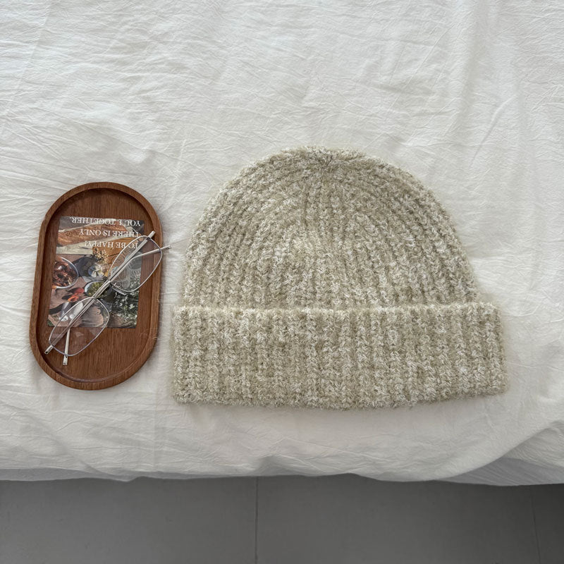 Beige textured fleck knit beanie flat lay