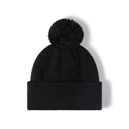 Black plush lined pom cuffed knit beanie overview