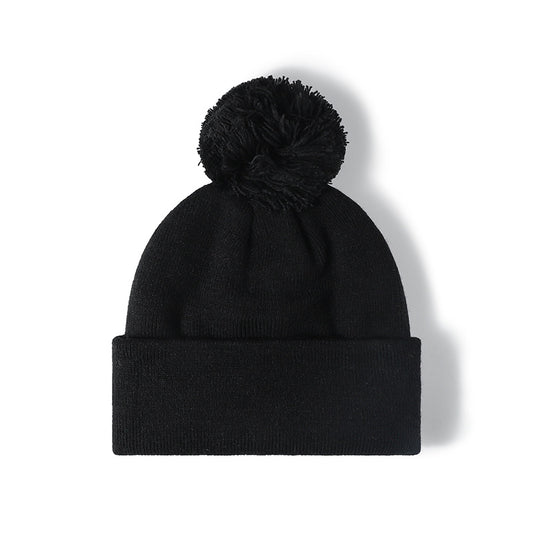 Black plush lined pom cuffed knit beanie overview